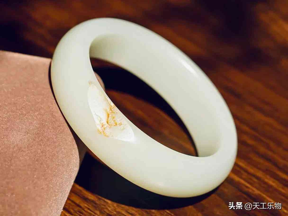 真正的和田玉手鐲(真正的和田玉手鐲多少錢一副)